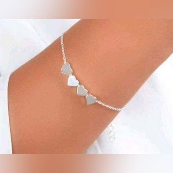 None Jewelry - Silver hearts bracelet